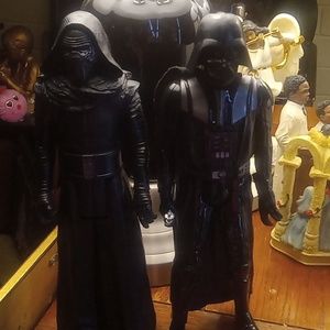 Two star wars toys dark Vader